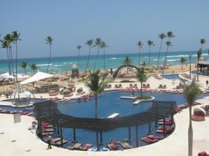 View of pool and ocean from the luxury oceanview room